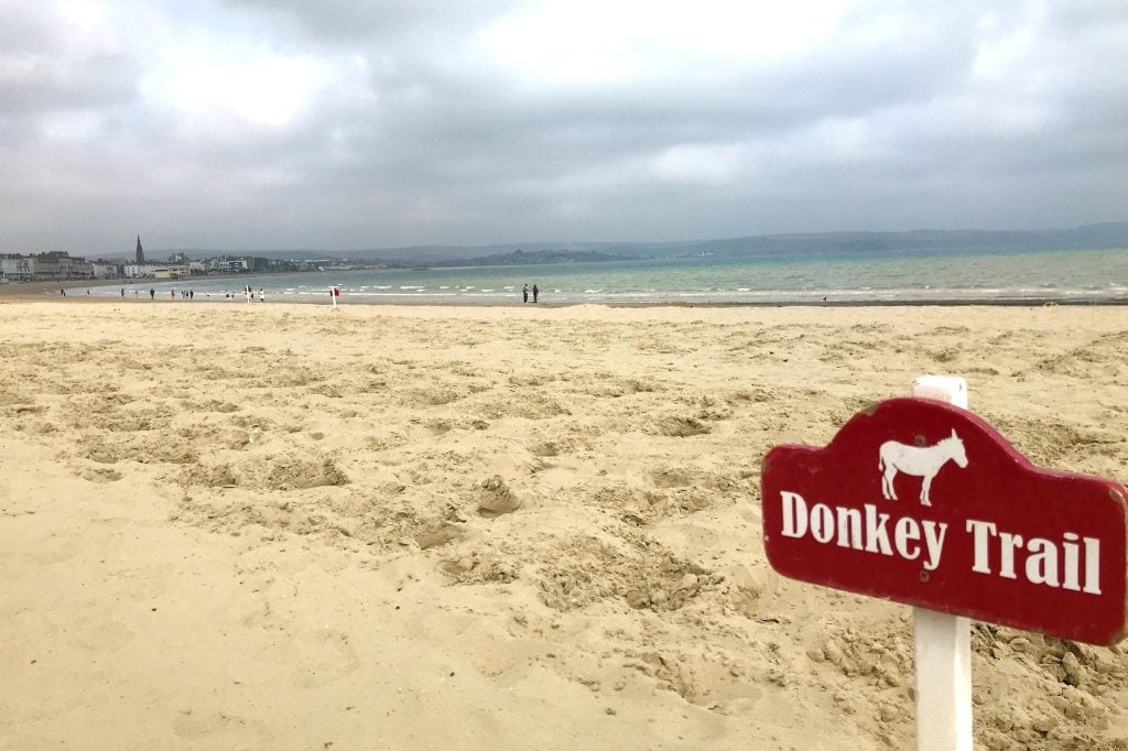 We love Weymouth - it's a huge stretch flanked by Georgian architecture and has a really lively atmosphere. With fish and chip shops, play areas, a helter-skelter, donkey rides and plenty of ice cream, this quintessential British beach is fun for the whole family and it's pretty, too.
