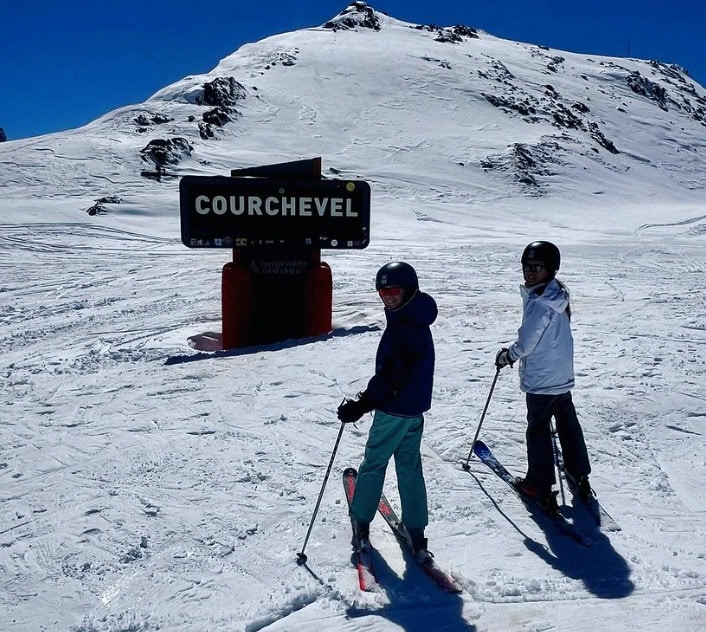With breathtaking landscapes that feel like you're skiing in a super-size postcard, the French Alps are home to the best ski holidays. From Courchevel to Val d'Isère, family ski resorts offer stellar snow, outdoor activities, and delicious regional food for memorable family holidays. An introduction to family ski resorts in France Some ski resorts are geared for seasoned skiers, others for fans of après-ski. A family ski resort offers both, and so much more, so that each member of the family has a wonderful holiday regardless of their age or skill level. In daily life, France puts family first, so its only natural they would extend this spirit onto the slopes. The country is so keen to welcome families that they've created the Famille Plus certification. It guarantees that the ski resort has all the amenities that families need, taking the guesswork out of knowing which resort to choose. What makes a ski resort family-friendly? On the slopes, you'll find premium ski schools with English-speaking instructors and group or private lessons. A family-friendly resort also has beginner runs for new skiers as well as free lift tickets for the youngest members of your family. Childcare facilities are available so that parents can hit the slopes. Away from the pistes, family ski resorts have loads of activities to please kids of all ages. Think ice skating, dog-sled rides, and indoor water parks. Ski-in/ski-out accommodation means parents don't have to lug equipment far. Plus, there are no shortage of kid-friendly restaurants. Top family ski resorts in the French Alps The most posh ski resort in the French Alps, Courchevel pampers families with high-end offerings like Michelin-starred restaurants and majestic hot-air balloon rides. A luxury chalet rental in Courchevel gives you privileged access to the largest skiable area in the world, Three Valleys. As is Méribel, whose central location makes it ideal for high-performance skiers. Brimming with Alpine authenticity, Méribel also charms for its family-friendly amenities like baby-sitting and all-level ski schools. Val d'Isère boasts a special area for young children to safely learn to ski, as well as cultural activities like farm visits to discover cheese-making. Chamonix has both beginner slopes and challenging off-piste trails, plus the highest cable car in the world, Aiguille du Midi. The highest resort in Europe, Tignes gets kids excited about snow in the igloo village at the children's area Best times to visit family ski resorts in France If you can take the kids out of school in November, this is a great time to take advantage of empty slopes and little queues for the lifts, though it won't be peak snow conditions. December, the official opening of ski season, is a festive, busy time at family ski resorts for a magical white Christmas. Early January is popular before school restarts, then the mountains are calmer starting the second week of the month. February brings excellent snow cover for a half-term holiday full of thrills and activities. March is one of the best times to ski in the French Alps thanks to warmer temperatures and fantastic snow conditions.